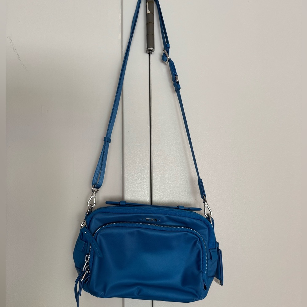 Tumi cross body bag in blue